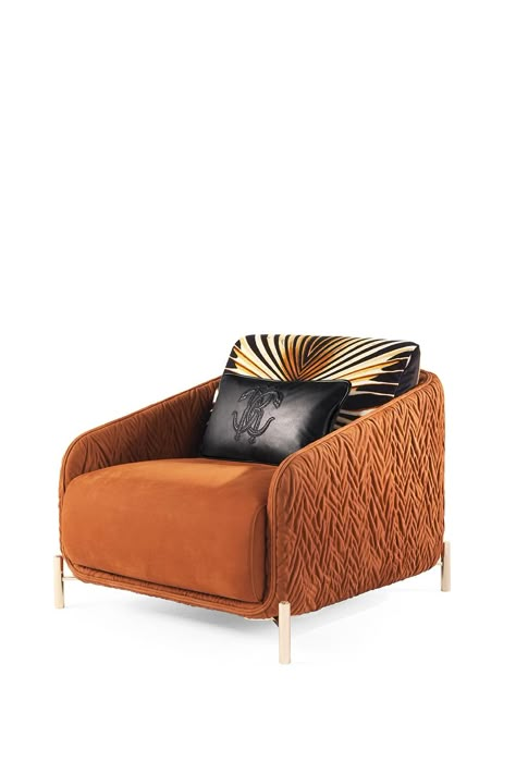 Wild charm and refined details for the Clifton armchair. Upholstered in nubuck, in an orange shade that evokes the warm and wild lands of the African savannah, the sofa features along the external structure the “spiga” quilting, while the back is upholstered with “Tigresse” velvet - pure animalier - winking at the most wild and sensual spirit of Roberto Cavalli Home Interiors. #robertocavallihomeinteriors #jumbogroup #interiors #interiordesign #fashiondesign #madeinitaly #armchair Armchairs Living Room Modern, Dining Room Design Luxury, Sofa Design Wood, Luxury Arm Chair, African Savannah, Crockery Unit, Luxury Furniture Living Room, Sofa Chairs, Furniture Design Living Room