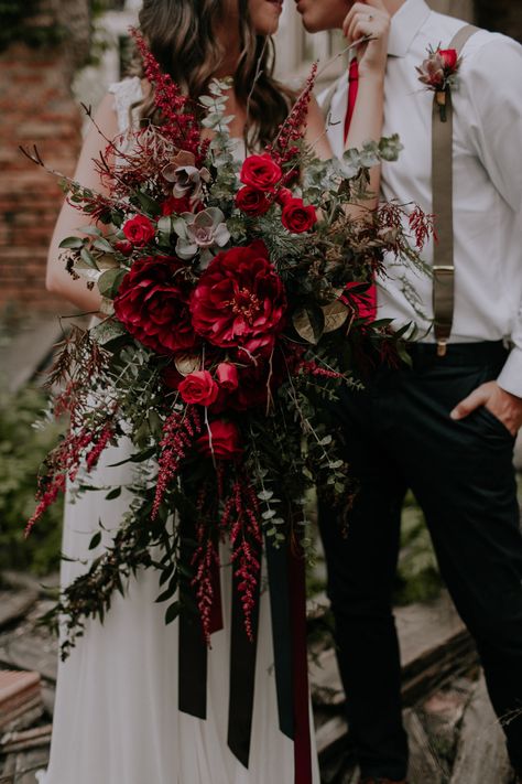 Cascading red roses bride bouquet Roses Bride Bouquet, Red Rose Bridal Bouquet, Classic Wedding Bouquet, Dark Wedding Theme, Green Wedding Bouquet, Red Wedding Theme, Red Bouquet Wedding, Winter Wedding Bouquet, Red Rose Wedding