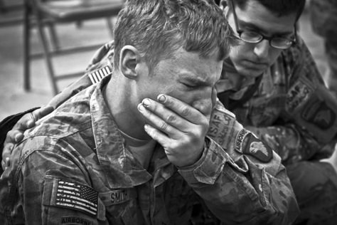 <i>Loss</i><br><br>Third Place, News. U.S. Army Soldiers assigned to Company C, 2nd Battalion, 327th Infantry Regiment, Task Force No Slack, 1st Brigade Combat Team, 101st Airborne Division, say farewell to fallen comrades during a memorial service for six fallen soldiers at Forward Operating Base Joyce in eastern Afghanistan's Kunar Province. Six troops were killed on the battlefield during combat operations a few weeks before. April 9, 2011. Us Army Soldier, Military Photography, 101st Airborne, 101st Airborne Division, Army Soldiers, Fallen Soldier, Us Soldiers, Army Soldier, Military Heroes