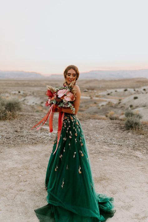 An emerald green wedding dress is a bold and unique choice for your wedding. Even if you don’t wear a glittering green gown as you walk down the aisle, the color is still an amazing choice for a bridal shoot or engagement photos. Photography: Lauren Wrigley Photography Green Wedding Gown, Emerald Wedding Dresses, Emerald Green Wedding Dress, Handfasting Dress, Green Wedding Dress, Fluffy Wedding Dress, Colored Wedding Gowns, Emerald Green Wedding, Green Wedding Dresses