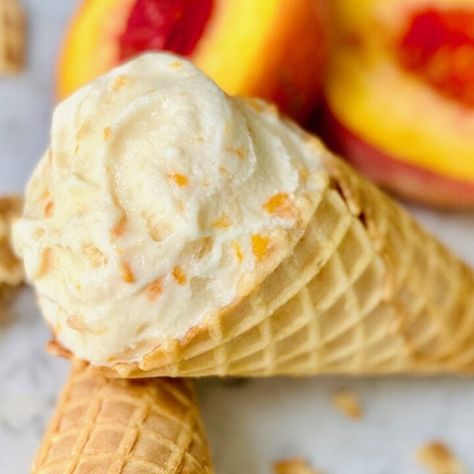 There's nothing like making your own Homemade Peach Ice Cream. It's filled with fresh peaches, real cream, and no eggs. It's a foolproof peach ice cream recipe you'll love making over and over again. #peachicecream #homemadeicecream #icecream #summerdesserts | QuicheMyGrits.com No Egg Ice Cream Recipe, Recipe With Eggs, Peach Ice Cream Recipe, Homemade Peach Ice Cream, Best Homemade Ice Cream, Ice Cream Recipes Machine, Peach Ice Cream, Ice Cream Maker Recipes, Homemade Vanilla Ice Cream