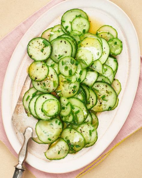 Tangy Cucumber Salad Recipe (Quick-Pickled) | The Kitchn Pickled Cucumber Salad, Side Dishes For Salmon, Vinegar Cucumbers, Easy Vegetable Side Dishes, Quick Pickled Cucumbers, Vegetable Side Dishes Recipes, Cucumber Recipes Salad, Homemade Pickles, Potluck Dishes