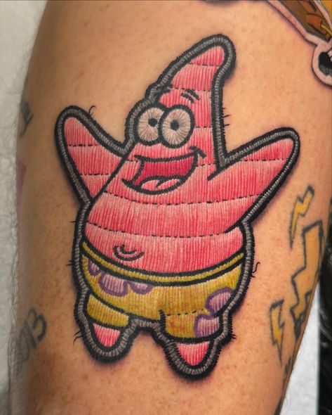 Patrick patch!!! What a happy little starfish fella he is 😂 Done on the same leg as the Spongebob sticker 😁 Thanks again Steven!!! __________________________________________ Sponsored by: @stencilstuff #embroiderypatch #embroiderypatchtattoo #embroiderytattoo #patchtattoo #spongebobtattoo #patricktattoo #realistictattoo #tattoo Stitched Tattoo, Patrick Tattoo, Patrick Star Tattoo, Spongebob Tattoo Ideas, Patch Tattoo, Patrick Starfish, Spongebob Tattoo, Sarah Tattoo, Embroidery Tattoo