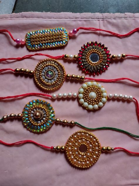 Hand Made Rakhi For School, Handmade Rakhi Designs Ideas Unique, Homemade Rakhi Designs, How To Make Rakhi For School Competition, Simple Rakhi Designs Handmade, Handmade Rakhi Designs Diy, Rakhi Making Ideas Handmade For Competition, Creative Rakhi Making Ideas, Rakhi Competition Ideas