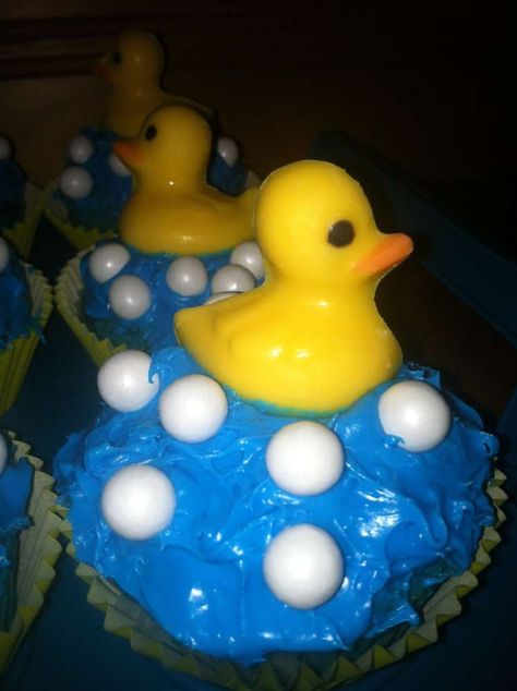 Cindy's Rubber Duckie Babyshower | CatchMyParty.com Duck Cupcakes, Yellow Desserts, Ducky Baby Showers, Duck Cake, Ducky Baby Shower, Rubber Ducky Baby Shower, Baby Shower Party Games, Kid Cupcakes, Rubber Duckies