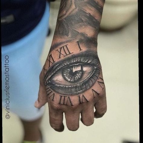 "Dazzle Your Friends with These Mesmerizing 3D Tattoos" Eye Hand Tattoo Men, Eye Tattoo On Hand, Best Hand Tattoos Men, Eye Hand Tattoo, Hand Tattoos Men, Sleeve Filler Ideas, Tattoo Background Filler, Tattoo Sleeve Filler Ideas, Quotes Tattoo Ideas