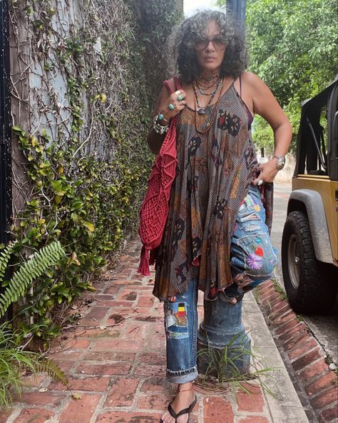 Saturday hangs! A day of errands, trying to stay cool in this heat. My hair is loving the humidity. We are doing my version of summer layers with a silk slip dress over my me made patchwork denim + flip flops + macrame bag + layers of jewelry. I absolutely love this little town I get to call home. #ootd #outfitinspo #outfitoftheday #whatiwore #styleover50 #islandlife #layeredjewelry #layeredclothing #vintage #thisisfreepeople @kanthabae #moonchildmini Oversized Women Outfit, Curvy Boho Outfits, Long Denim Dress Outfit, Summer Layers Outfit, How To Layer Clothes, Slip Dress Layering, Bohemian Witch, 80’s Outfits, Hippie Fits