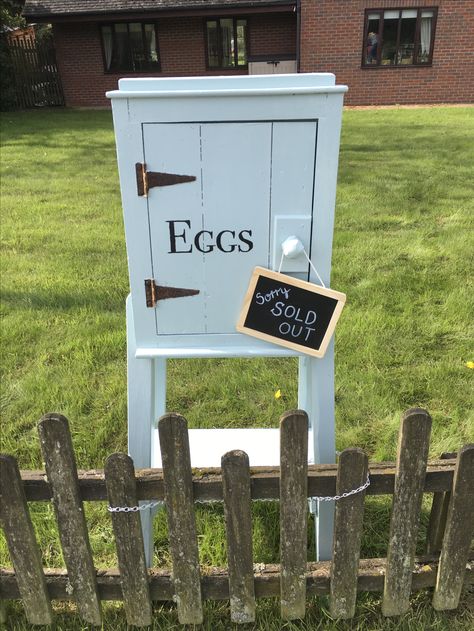 My repurposed egg shed. It was filthy and brown, covered in bird droppings and dust when we brought it. It had spent at least 60 years in a barn. I cleaned and painted it. Now it's at the side of the road, our egg honesty box. First day we sold out in 4 hours!! Honesty Box For Eggs, Road Side Stands, Road Side Egg Stand, Road Side Stand Ideas, Egg Stand Roadside, Roadside Stand, Vegetable Stand, Eggs For Sale, Chicken Coup