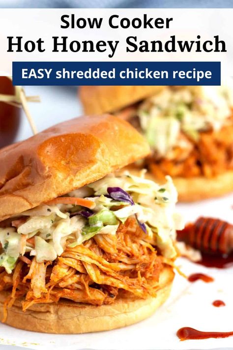 Make a crowd-pleasing, easy dinner with this Slow Cooker Hot Honey Chicken Sandwiches recipe! Cook your chicken breast low and slow in the Crock Pot for perfectly tender shredded chicken. Then cover in the best ever sweet and spicy sauce and layer on toasted buns with creamy coleslaw. The best part? The whole recipe only requires 15 minutes of hands-on time! Crock Pot Hot Honey Chicken Sandwich, Spicy Bbq Pulled Chicken Crockpot, Crock Pot Bbq Chicken Sandwiches, Crockpot Chicken Recipes Sandwiches, Pulled Chicken Crockpot Recipes, Crock Pot Chicken Sandwich Recipes, Honey Garlic Chicken Sandwich, Chicken Sandwich Crockpot Recipes, Easy Pulled Chicken Crockpot