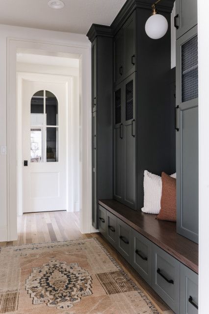 English Tudor - Transitional - Salt Lake City - by Remedy Design Firm | Houzz Mudroom Main Entrance, Fire Door To Garage, Mudroom 2023, Sloped Closet, Moody Mudroom, Transitional Mudroom, Storage Nook, Lavender Farms, Mudroom Remodel