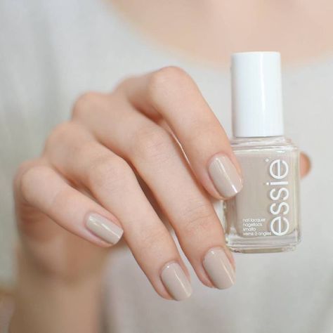 The seductive power of soft sandy beige nail polish is not to be underestimated. trend-setting, neutral pastel, essie 'sand tropez' is the most alluring manicure on the riviera – or anywhere else. Essie Nails, Neutral Nail Color, Nails Neutral, Nails Yellow, Nail Color Trends, Cute Nails For Fall, Manicure Gel, Nagel Tips, Beige Nails