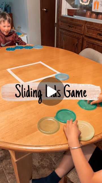 Brittany | Kids/Toddler/Baby Activities on Instagram: "If you are having a rainy holiday weekend like we are, try out this game with your kids! It’s quick and easy to set up. 

Grab some lids, use masking tape to create a square in the middle of your table and you are ready to play!

Take turns trying to slide your lids into the square. Also, try to knock out your opponent’s lids. Whoever has the most lids left in the square, wins! 

Inspired by: @papa_3dochki 

#kidsactivities #kidsactivity #kidsactivityideas #toddleractivities #toddleractivity #familygames #familygamenight #letskeepkidsbusy" Turn Taking Activities Toddlers, Turn Taking Games For Preschoolers, Table Top Activities For Preschoolers, Turn Taking Activities, Weekend Activities For Kids, Games To Play With Kids, 6 Class, Stem Crafts, Baby Activities