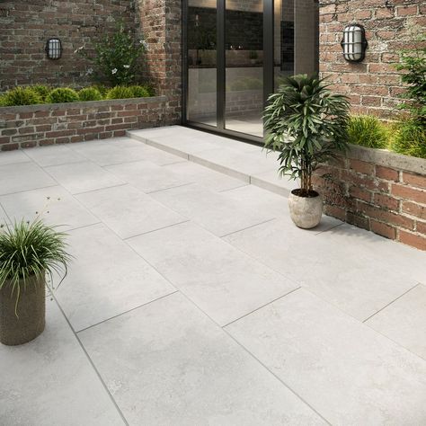 Refresh your outdoor floors with these elegant stone effect Mineral Shell Porcelain Tiles, a stylish light beige toned tile perfect for brightening up your patio. Outdoor Tiles Floor, Limestone Patio, Brick Planter, Terrace Tiles, Outdoor Porcelain Tile, Porch Tile, Outdoor Paving, Patio Steps, Patio Slabs