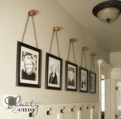 Make your house a home with these stylish ways to display family photos. School Pictures Display, Picture Display Wall, Family Photo Gallery Wall, Hallway Pictures, Family Pictures On Wall, Photo Wall Display, Display Family Photos, Family Photo Wall, Diy Wand