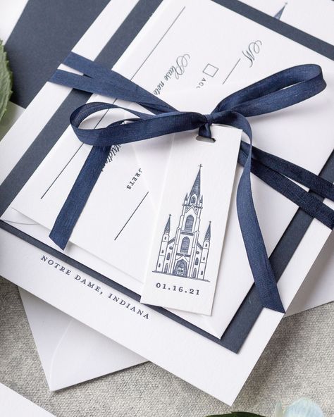 Timeless elegance with a personal touch ✨ This semi-custom invitation suite features a hand-drawn illustration of the iconic Basilica of the Sacred Heart at Notre Dame, beautifully printed in navy letterpress on crisp white cotton paper. A delicate navy ribbon tied in a bow holds everything together, complete with a charming tag showcasing the couple’s wedding date. Perfect for a classic wedding with meaningful details. 💙⁠ ⁠ Planning your Notre Dame wedding? Let us create something uniquely y... Save The Date With Ribbon, Notre Dame Wedding, Ribbon Invitation, Instagram Features, Timeless Wedding Invitations, Nola Wedding, Navy Ribbon, Personalized Ribbon, The Sacred Heart