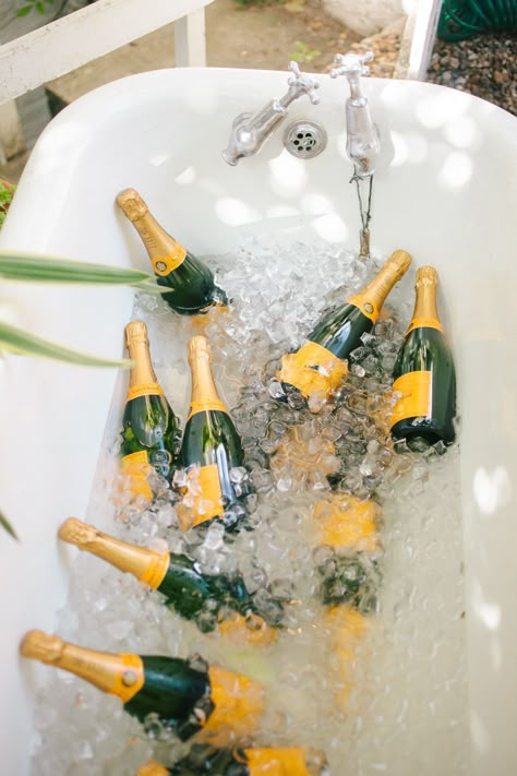 Let's fill the bathtub with Champagne! :) Absolutely, and it was exactly what we did at Nina + Sergio's pub style wedding bash in Dalston, East London. Looked great in the garden of The Roost, a fab venue, filled with props and all the different rooms you can wish for to explore. #Londonwedding #nontraditionalweddingvenue #Londonweddingplanner #Weddingplanningideas Champagne In Bathtub, Miami Style Party Decor, Champagne Bathtub, Wedding Drink Decor, Bejeweled Party, Champagne Decor, Wedding Bars, Shower Gif, Veuve Cliquot