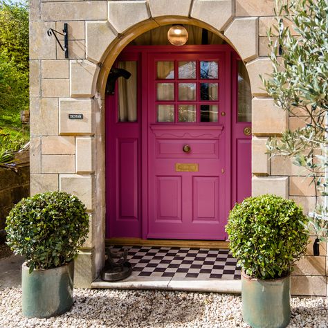 Custom carpentry 1930's pink front door with antique brass hardware, glass pumpkin pendant light and original 1930'S tiles. Pinkfront Door, Bright Pink Front Door, Dark Pink Front Door, Light Pink House Exterior, Pink Front Doors, Pink House Exterior, Pink Doors, Custom Carpentry, Blue Bungalow