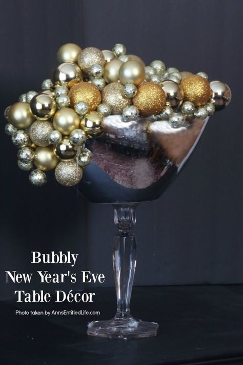 Bubbly New Year's Eve Table Décor. This upcycled New Year’s Eve décor is a great celebration centerpiece! You can use this champagne bubbly inspired craft for your champagne party, as an accent at a party bar or as fun décor at any cocktail party – or simply leave it up year-round on your wet bar. Super easy to make, this Bubbly New Year’s Eve Table Décor piece can be made in gold, silver, copper, rose gold, or pink champagne colors for a great added sparkle decoration adorning your party tablet New Year Party Centerpieces, New Year’s Eve Centerpiece, New Years Centerpiece Ideas, Champagne Party Ideas, New Years Eve Table Decorations, New Years Eve Wedding Ideas, Diwali Dinner, Ice Table, Nye Party Decorations