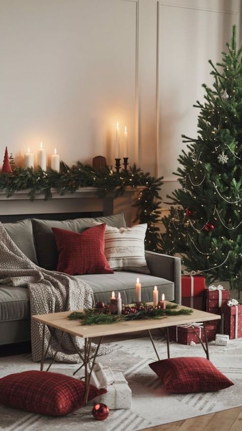 Inspired by Scandinavian style, this décor focuses on minimalist design, clean lines, and cozy vibes. Stick to neutral tones like white, grey, and soft beige. Choose simple wooden ornaments, natural wreaths, and knit blankets. Incorporate items like paper stars, wooden figurines, and candles to create a peaceful and inviting holiday atmosphere. Grey Sofa Christmas Decor, Grey Couch Cozy Living Room, Gray Couch Christmas Decor, Grey Couch Christmas Decor, Christmas Decorating Living Room, Colorful Small Living Room, Small Living Room Christmas Decor Ideas, Living Room Decor Ideas Grey, Room With Gray Couch