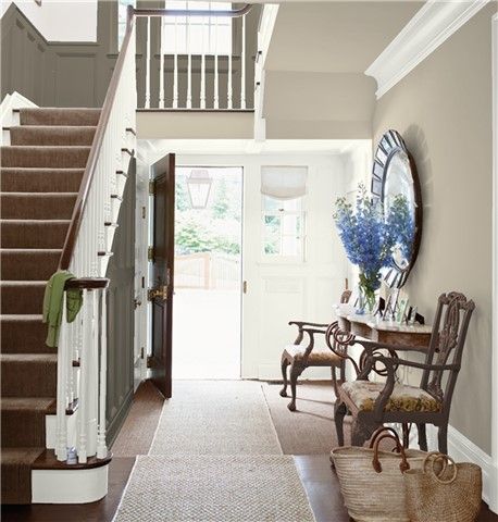 Look at the paint color combination I created with Benjamin Moore. Via @benjamin_moore. Walls: Pashmina AF-100; Trim: White Dove OC-17; Stair Wainscot: Gargoyle 1546; Chairs: Appalachian Brown 2115-10. Grey Painted Stairs, Pale Oak Benjamin Moore, Stairs Painted, Blue Benjamin Moore, Navy Blue Paint Colors, Grey Wall Color, Gray Painted Walls, White Stairs, Color Combinations Paint