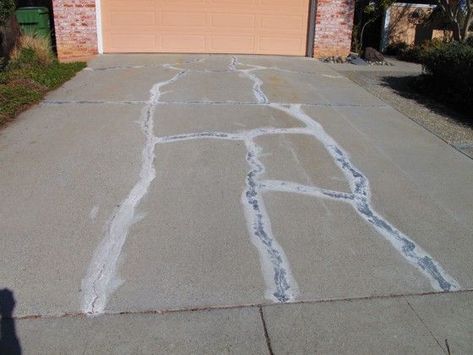 Resurface a Cracked Concrete Driveway Concrete Patio Resurfacing, Fix Cracked Concrete, Repair Concrete Driveway, Concrete Driveway Resurfacing, Driveway Paint, Concrete Refinishing, Cement Driveway, Repair Cracked Concrete, Patio Repair