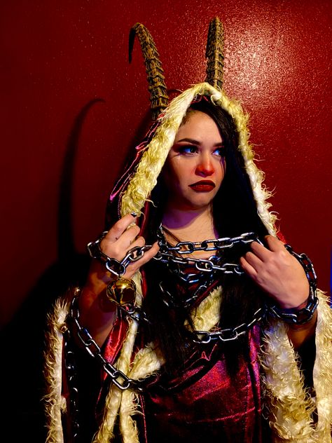 Used Spirit Halloween Krampus animatronic robe, horns and chains for this  photo shoot. Female Krampus, Krampus Costume, Christmas Costumes Women, Yule Celebration, Witches Night Out, Creepy Christmas, Christmas Shoot, Holiday Images, Steampunk Cosplay