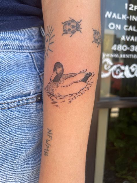 Park Ranger Tattoo, Mallard Tattoo Ideas, Duck In Water Tattoo, Mallard Duck Tattoo Black And White, Flora Fauna Tattoo, Duck Pond Tattoo, Feminine Animal Tattoos, Water Off A Ducks Back Tattoo, Rubber Stamp Tattoo