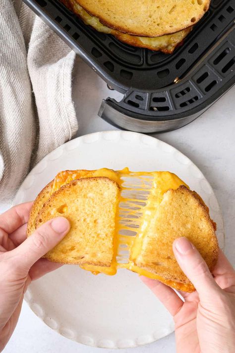 Have you tried cooking a Grilled Cheese in the air fryer? The bread turns perfectly crispy, and the cheese melts just right. | How to Air Fry a Grilled Cheese Sandwich | Easy Air Fryer Grilled Cheese Sandwich | Air Fry Grilled Cheese, Air Fryer Grilled Cheese Sandwich, Air Fryer Grilled Cheese, Tuna Melt Sandwich, Chicken Parmesan Sandwich, Fancy Grilled Cheese, Sandwich Easy, Sandwich Sides, Classic Grilled Cheese