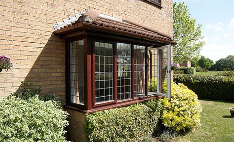 Dark woodgrain uPVC square bay window Bay Window Elevation Design, Upstairs Bay Window Exterior, Square Bay Window Exterior, Box Bay Windows Exterior, Box Bay Window Exterior, Square Bay Window, Oriel Windows Bays, Small Bay Window, Box Bay Window