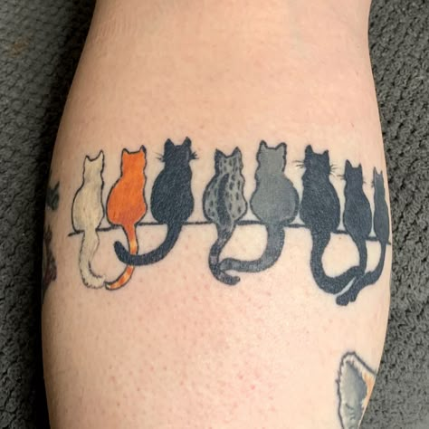 Multiple Cat Tattoo Designs, Cat Tattoo Multiple, 5 Cat Tattoo, Cat Arm Band Tattoo, Multiple Cat Tattoo Ideas, Orange And Black Cat Tattoo, 5 Cats Tattoo, Negative Space Cat Tattoo, Multiple Cats Tattoo