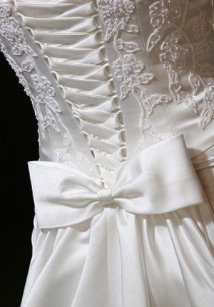 I love the idea of a bow on the back under the corset to hide the bulge where the ribbon is tucked in. Maybe add some color with the bow. Ribbon Corset Dress Back, Back Of Dress Ideas, Wedding Dresses Corset Back, Mermaid Ruffle Wedding Dress, Creating Clothes, Wedding Dress With Corset, Dresses Corset, Wedding Dressses, Wedding Dress Alterations