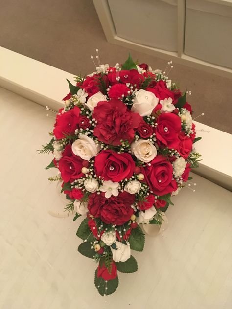 Red & ivory artificial teardrop bouquet Red Bouquet Quinceanera, Quince Ramos Red, Red And White Quince Bouquet, Red Roses Bouquet Quince, Ramo Natural Quinceanera Red, Red And White Cascade Bouquet, Red Flower Bouquet, Red Quince, Quinceanera Bouquet