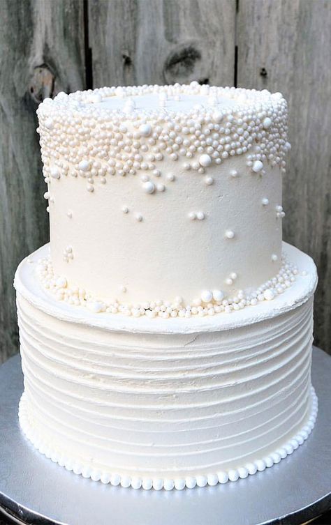 pearl wedding cake, wedding cake, wedding cake ideas, pearl wedding cake, pearl embellishment cake, wedding cakes with pearls, cake with pearls, cake with pearls and flowers, edible pearls wedding cake, latest wedding cake gallery Pearlescent Wedding Cake, Pearl Cake Design, Pearl Wedding Cakes, Wedding Cake With Pearls, White Buttercream Cake, Beaded Wedding Cake, Diamond Anniversary Cake, Cake With Pearls, Silver Wedding Anniversary Cake