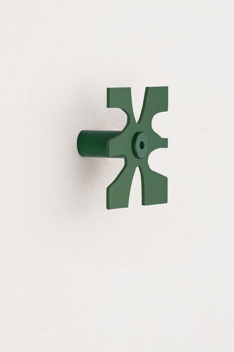 The Klipp is a sculptural and modern decorative wall hook made to hang bags, jackets, hats, and more. This colorful stand-off wall hook features a unique abstract shape and is crafted from metal with a powder coat finish. Easy to install, our unique wall hanger makes home storage and organization fun and functional. Modern Decorative Wall, Hang Bags, Sculptural Wall, Pine Walls, Fun Organization, Decorative Wall Hooks, Abstract Shape, Unique Shapes, Patina Finish