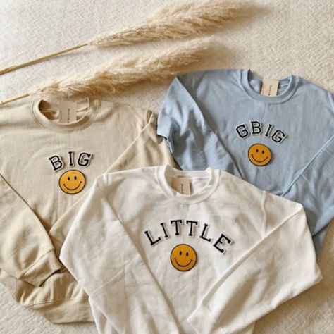 This cute Big Little Sorority Sweatshirts are great for Big Little Reveal / Bid day! They are perfect to give to your big/lil as a gift and match outfits with! <3

- These letters are iron-on patched and is heat pressed, not embroidered.
- All our sweatshirts run a Unisex fit. They are naturally oversized, but if you like a more baggy look, we recommend sizing up. Big Little Reveal Shirts, Big Lil Gifts, Big Little Themes, Big Little Sorority Shirts, Big/little Baskets, Little Gifts Sorority, Big Little Basket, Big Little Sorority, Big Little Ideas