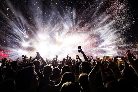 Free Photo | Excited audience watching confetti fireworks and having fun on music festival at night copy space Concert Poster Ideas, Gaslight Anthem, Eid Background, Bloc Party, Jorja Smith, Warner Music Group, Liam Gallagher, New Background Images, Chance The Rapper