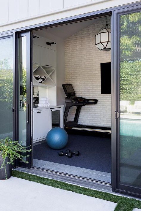 White Built In Shelves, Morris Lantern, Den Library, Cheviot Hills, Tv Lighting, Beverage Fridge, Suzanne Kasler, Library Office, Sliding Glass Doors