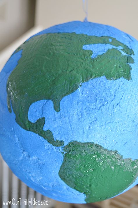 DIY globe made from styrofoam Diy Globe, Globe Projects, Planet Project, 3d Globe, Styrofoam Crafts, Blue Spray Paint, Globe Crafts, Painted Vinyl, Sanding Block