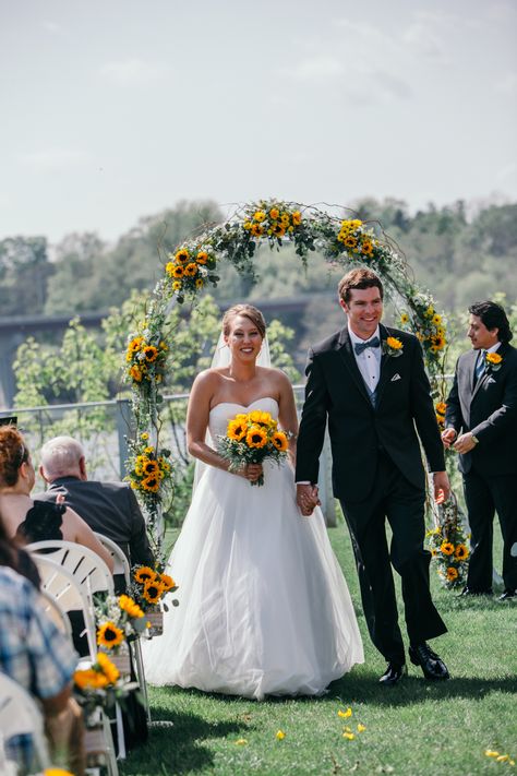 Sunflower arch, sunflower aisle, sunflower bouquet, and sunflower boutonnière. Sunflower Wedding Dress, Sunflower Arch, Pictorial Ideas, Sunflower Wedding Cake, Blue Wedding Decorations, Wedding Entourage, Wedding Car Decorations, Sunflower Themed Wedding, February Wedding