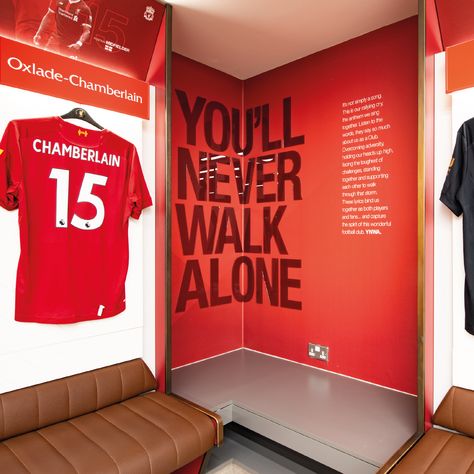 Dressing Room Innovation 📣 The project at LIVERPOOL FOOTBALL CLUB included a fully interchangeable solution to the home dressing room area and tunnel. This allows a swap of player details and graphics between guided tour times and Premier or Champions League matchdays. We were pleased to be able to provide an innovative product that both fulfilled the purpose and looked great at the same time. #Innovation #Anfield #LFC #discoverunder5k Football Office Design, Liverpool Room Ideas, Liverpool Bedroom Ideas, Football Office, Dressing Room Interior Design, Home Dressing Room, Football Locker Room, Board Room Design, Dressing Room Interior