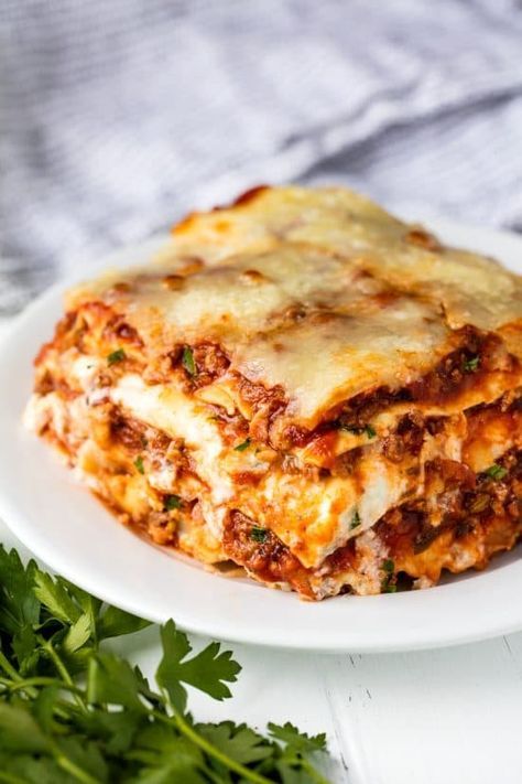 The Most Amazing Lasagna Recipe is the best recipe for homemade Italian-style lasagna. The balance between layers of cheese, noodles, and homemade bolognese sauce is perfection! Most Amazing Lasagna, Homemade Bolognese Sauce, Lasagna Recipe With Ricotta, Classic Lasagna Recipe, Best Lasagna Recipe, Sausage Lasagna, Lasagna Casserole, Easy Lasagna Recipe, Lasagne Recipes