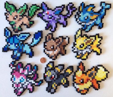 Perler Beads Pokemon Eeveelutions, Evee Pokemon Perler, Eevee Evolutions Perler Beads, Evee Evolution Pixel Art, Evee Evolution Perler Beads, Leafeon Perler Beads, Eevee Perler Beads, Sylveon Perler Beads, Eeveelutions Perler