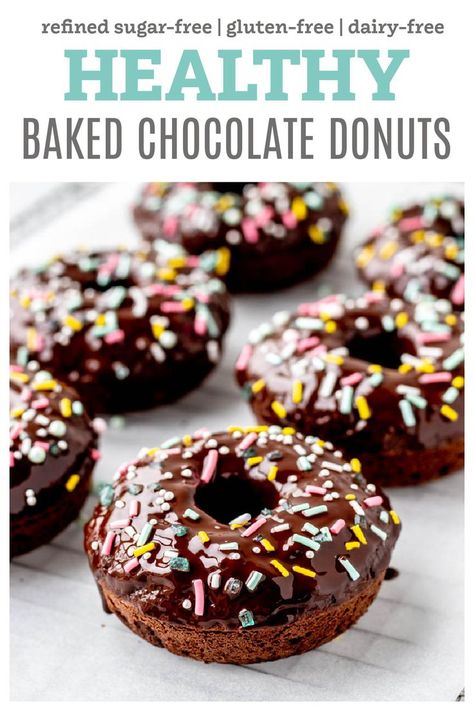 These healthy chocolate baked donuts are the ultimate rich, yet healthier treat! Baked rather than fried, these fluffy glazed donuts are made from scratch with oat flour and almond flour for a nutrient-packed sweet treat. They require no yeast and are super easy to make for a fun dessert, snack, or breakfast! {Gluten-free & dairy-free-friendly} Healthy Breakfast Donut Recipe, Healthy Chocolate Donuts Baked, Baked Donuts With Donut Pan Healthy, Healthy Baked Doughnut Recipes, Black Bean Donut Recipe, Almond Flour Baked Donut Recipe, Oat Flour Donut Recipe, Healthy Mini Donut Recipe, Healthy Baked Donut Recipes