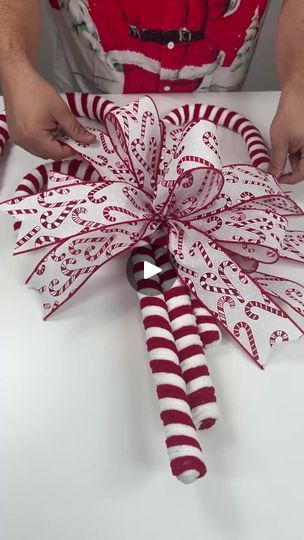 Let’s design with giant candy canes | By Nick's Seasonal Décor | Facebook Diy Christmas Decorations Candy Canes, Candy Cane Outside Decorations, Candy Cane Christmas Party Decorations, Candy Cane Door Decoration, Dollar Tree Candy Cane Wreath Diy, Candy Canes Aesthetic, Candy Cane Theme Decorations, Candy Cane Decorations Diy, Diy Candy Cane Decorations