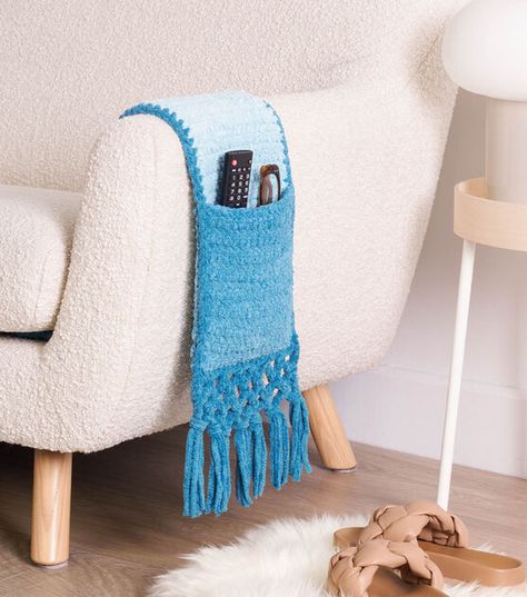 How To Make Bernat Perfect Phasing Crochet Slim Sofa Caddy Online | JOANN Crochet Caddy, Slim Sofa, Crochet Chain Stitch, Decorative Crochet, Crochet Organizer, Cat Couch, Treble Crochet, Crochet Blanket Pattern Easy, Bernat Blanket