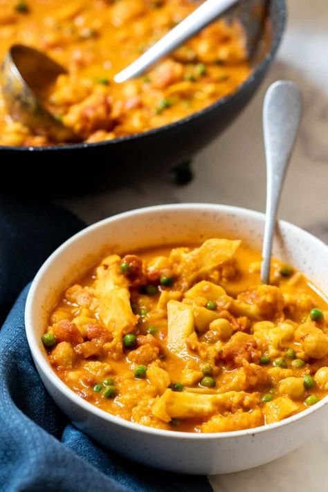 Cauliflower Chickpea Curry - Vanilla Bean Cuisine vegetarian recipes Califlower Curry, Cauliflower Chickpea Curry, Chickpeas And Potatoes, Cauliflower And Chickpea Curry, Veg Gravy, Cauliflower Chickpea, Indian Vegetarian Dishes, Chickpea Curry Recipe, Cauliflower Curry