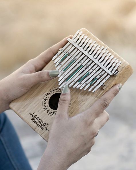 The Kalimba, also called a thumb piano, is a percussion instrument that originated from Africa many years ago. Originally, it was made of wood (and called an mbira). Modern kalimbas are constructed with a wooden sound board and metal tines. Tines are flat bars that can be tuned to different pitches. The thumb piano is played by gently pressing down and releasing the tines with-you guessed it-your thumbs! We used our kalimbas during the study of jazz pianist and activist Nina Simone as a way to p Jazz Pianist, Sound Board, Music Tutorials, Subscription Boxes For Kids, Thumb Piano, Major Scale, Percussion Instrument, Fun Songs, Nina Simone