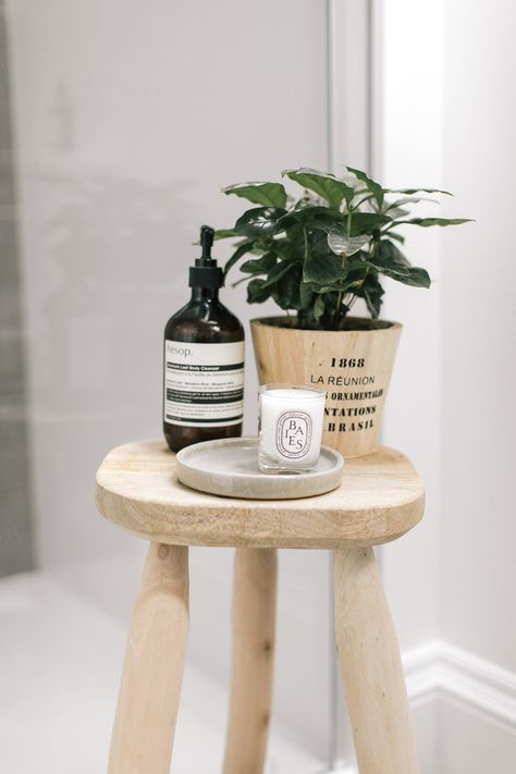 Rustic Wooden Bathroom Stool | Aesop Body Cleanser | Diptique Baies Candle Wooden Stool For Bathroom, Stools In Bathroom, Bathroom Stool Decor Ideas, Wooden Stool In Bathroom, Bathroom Wooden Stool, Bathroom Stools Wooden, Aesop Bathroom Styling, Candle In Bathroom, Bathroom Stool Styling