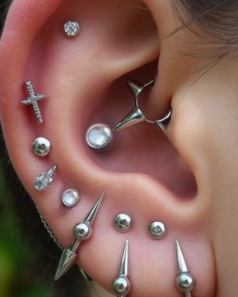 Add a modern edge to your professional attire with spike earrings. #spike #spikeearrings #spikeessential #piercing Piercings Goth, Spike Earrings, Professional Attire, Piercings, Instagram