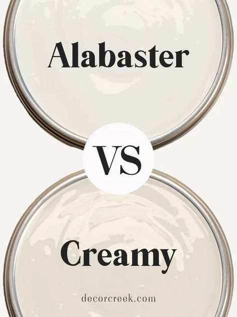 The image displays a comparison between two paint colors, "Alabaster" and "Creamy." Both color names are placed inside the outline of paint cans, with "Alabaster" at the top and "Creamy" at the bottom. In the center, there is a large "VS" inside a circle, indicating a contrast between the two shades. The background shows a soft, neutral palette, highlighting the subtle differences between these two off-white colors. Creamy Sherwin Williams Walls, Best Trim Color For Alabaster Walls, Sw Alabaster Walls, Off White Paint Colors, Sherwin Williams Alabaster, Beige Paint, Popular Paint Colors, Farmhouse Paint Colors, Cozy Interiors